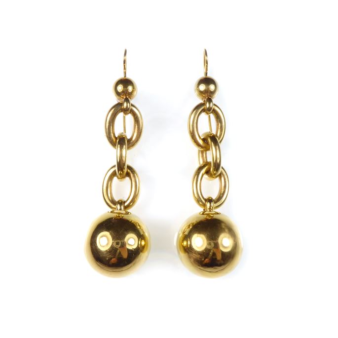 Pair of gold ball pendant earrings, each hung with a polished sphere | MasterArt